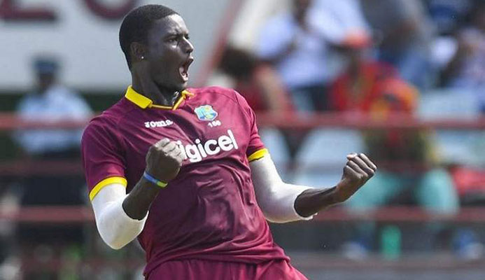 Warrior spirit: West Indies captain Jason Holder bellows in celebration of the wicket of Pakistan opener Ahmed Shehzad during the third and final One-Day-Internaional at the Guyana National Stadium, Providence, Guyana on Tuesday. Pakistan won by six wickets. —Photo: WICB Media/Randy Brooks