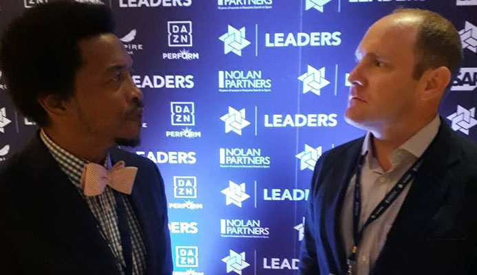 TTOC President Brian Lewis, left, chats with Whitney Kirkland, Partner, Firebrand Event Productions, at the 5th annual Leaders Sport Business Summit at The TimesCenter, New York, yesterday.