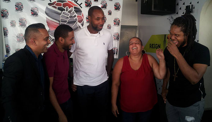 MX Prime, right, shares a light moment with other organisers of the Football For a Cause relief football match at #63 Bar in Woodbrook, yesterday. Also in the photograph are (from left) Shaun Fuentes, director of communications at the TT Football Association, Kyle Lequay, sports marketing consultant, TT men’s football coach Dennis Lawrence and assistant secretary general of the TT Olympic Committee Nadine Khan.