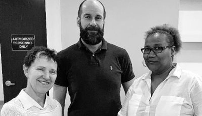 T&T Pro League interim Chief Executive Officer Julia Baptiste, right, extends gratitude to Eva Pasquier, head of international relations at UEFA, while UEFA ASSIST’s Kenny MacLeod looks on following a three-day UEFA ASSIST-Trinidad workshop, which ended on April 6 at the National Cycling Centre in Balmain, Couva.