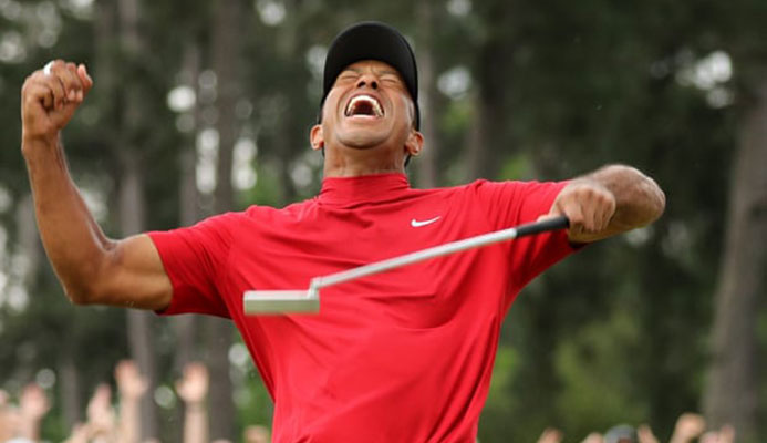  Tiger Woods celebrates after sinking his putt on the 18th that won a fifth Masters at Augusta National. Photograph: Lucy Nicholson/Reuters