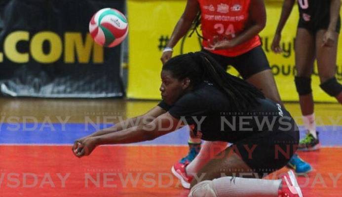 Triple T La Cura Sport's Rheeza Grant makes a pass as teammate Courtnee-Mae Clifford looks on. -