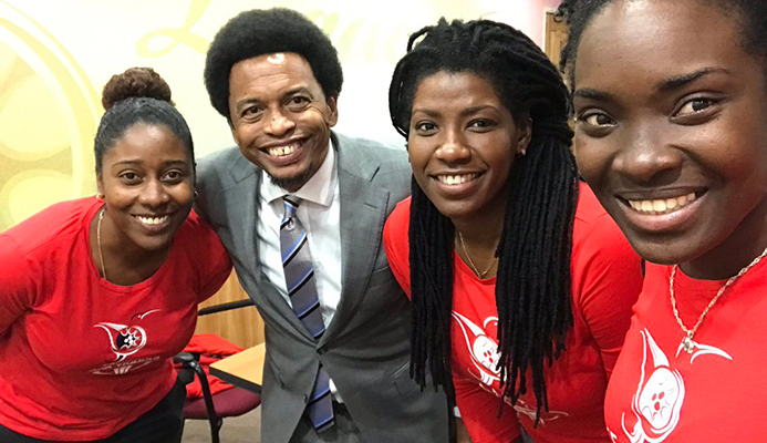 Trinidad and Tobago Olympic Committee President Brian Lewis with Rheeza Grant, Kwanieze John and Chanelle Young, the driving forces behind the country's successful bid to host the 2021 Commonwealth Youth Games ©TTOC