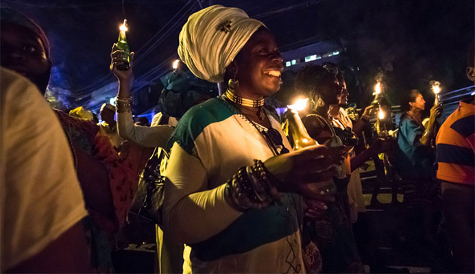 The flambeaux street procession is a hallmark of Emancipation celebrations. Photo by Maria Nunes