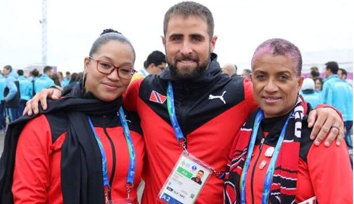 Flag bearer national sailor Andrew Lewis, centre, with Chef de Mission Diane Henderson, right, and Deputy Chef de Mission Lovie Santana at Pan American Games in Lima, Peru.