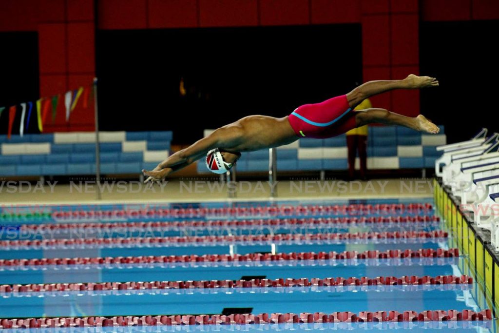 Josiah Parag takes part in the Amateur Swimming Association of Trinidad and Tobago's Boys 200m individual medley long course trials, at the National Aquatic Centre, Couva, on Monday night. - Lincoln Holder