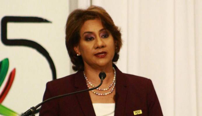 First Citizens Group Chief Executive Officer Karen Darbasie during her presentation of the bank’s 22nd annual shareholders meeting at the Hilton Trinidad and Conference Centre yesterday.  NICOLE DRAYTON