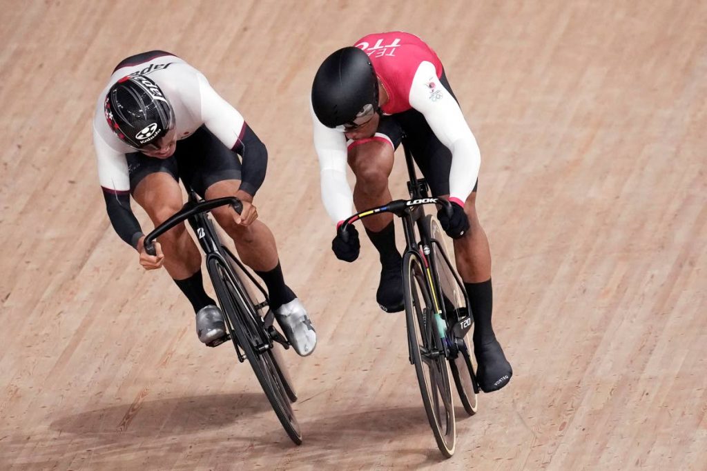 Nicholas Paul of Trinidad And Tobago, right, and Yuta Wakimoto of Japan compete during the track cycling men's omnium scratch race at the 2020 Summer Olympics, on Aug. 5, 2021, in Izu, Japan. (AP Photo) -