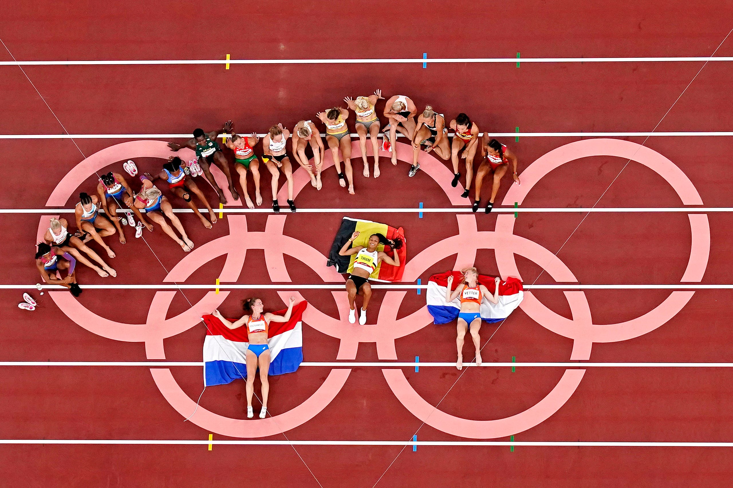 August 5, 2021: Competitors in the women's heptathlon pose for a picture on the Olympic Rings during the Tokyo 2020 Olympic Summer Games at Olympic Stadium. JAMES LANG, JAMES LANG-USA TODAY SPORTS
