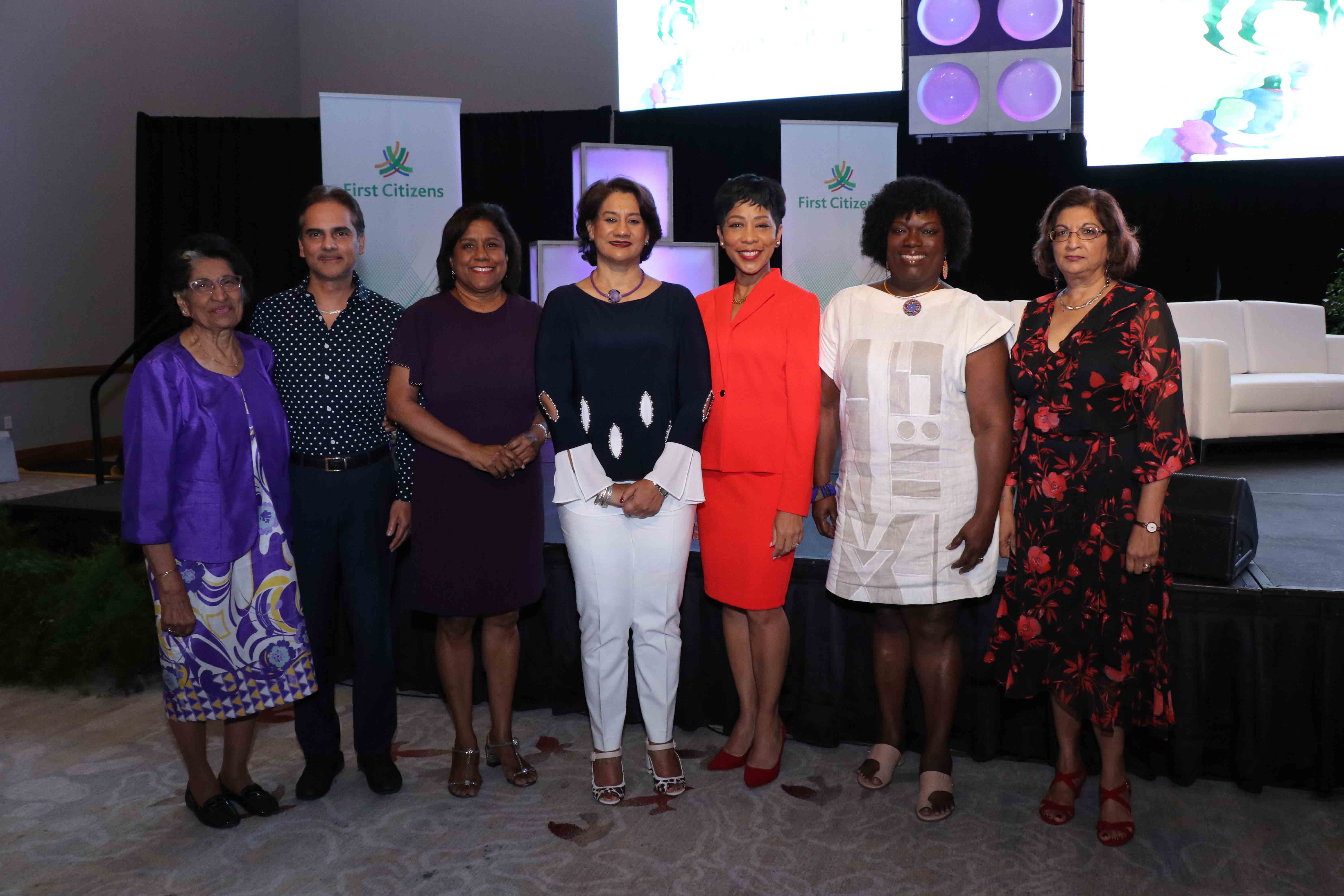 Zalayhar Hassanali, Former First Lady; Professor Sterling Frost, First Citizens Group Deputy CEO – Operations & Administration; Senator the Honourable Paula Gopee-Scoon, Minister of Trade and Industry; Karen Darbasie, First Citizens Group CEO; Sharon Clark-Rowley, wife of Dr. the Honourable Keith Rowley and Attorney-at-Law; Her Honour Deborah Thomas-Felix, President of the Industrial Court; and Emerita Professor Patricia Mohammed at the annual First Citizens Women First Conference.