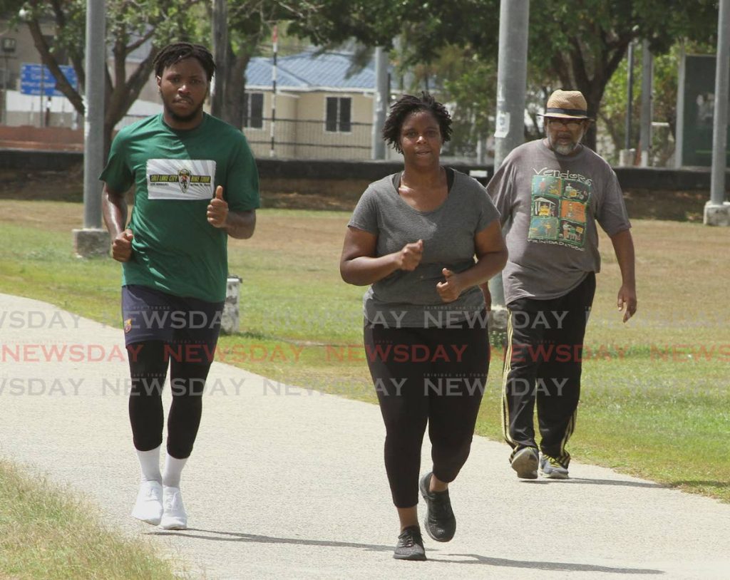 File photo: Joggers exercise along the track at Eddie Hart Savannah last month. TTEC will be turning lights back on at the various community grounds. PHOTO BY AYANNA KINSALE -
