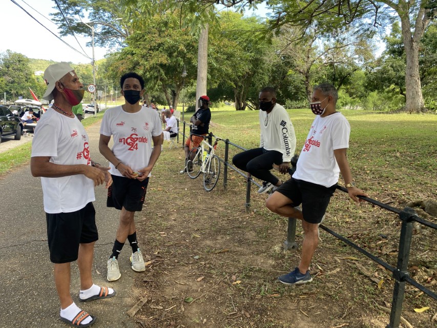 TTOC WALKERS: Minister of Agriculture, Land and Fisheries Clarence Rambharat, right, speaks with Trinidad and Tobago Olympic Committee president Brian Lewis, second from left, and Richie Rahim, the first walker to the finish, after Sunday’s 26.2 mile TTOC Marathon Walk that concluded in front of Whitehall at the Queen’s Park Savannah, Port of Spain. —Photo: Melanie Gulston/Team TTO Media