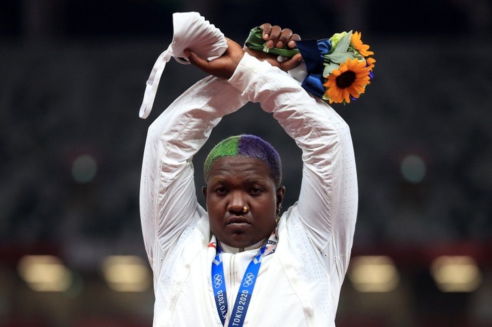 American Raven Saunders made this gesture on the medal podium after winning silver in the women's shot put