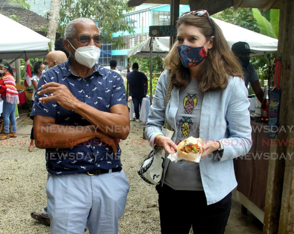 British High Commissioner to TT Harriet Cross with former TT Olympian Wendell Mottley at the Green Market in Santa Cruz on Saturday during the meet-and-greet event with Commonwealth ambassadors to TT. PHOTO BY ROGER JACOB -