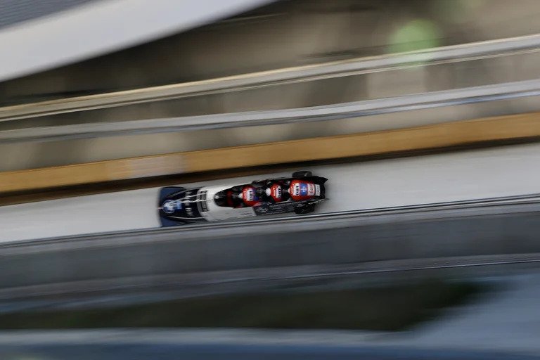 Skeleton - Beijing 2022 Winter Olympics Test Event - IBSF Bobsleigh International Sanctioned Race - Yanqing National Sliding Center, Yanqing, China - October 26, 2021 Switzerland's Michael Vogt, Alain Knuser, Cyril Bieri and Sandro Michel in action during the Men's 4-man bobsleigh REUTERS/Tingshu Wang