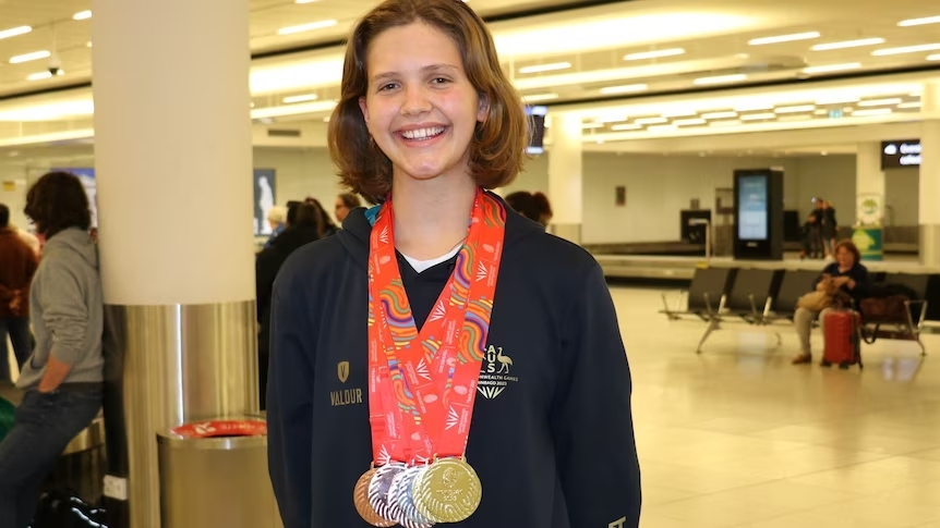 Inez Miller with her seven medals from the Trinbago Commonwealth Youth Games.(ABC News: David Weber) (Image obtained at abc.net.au)