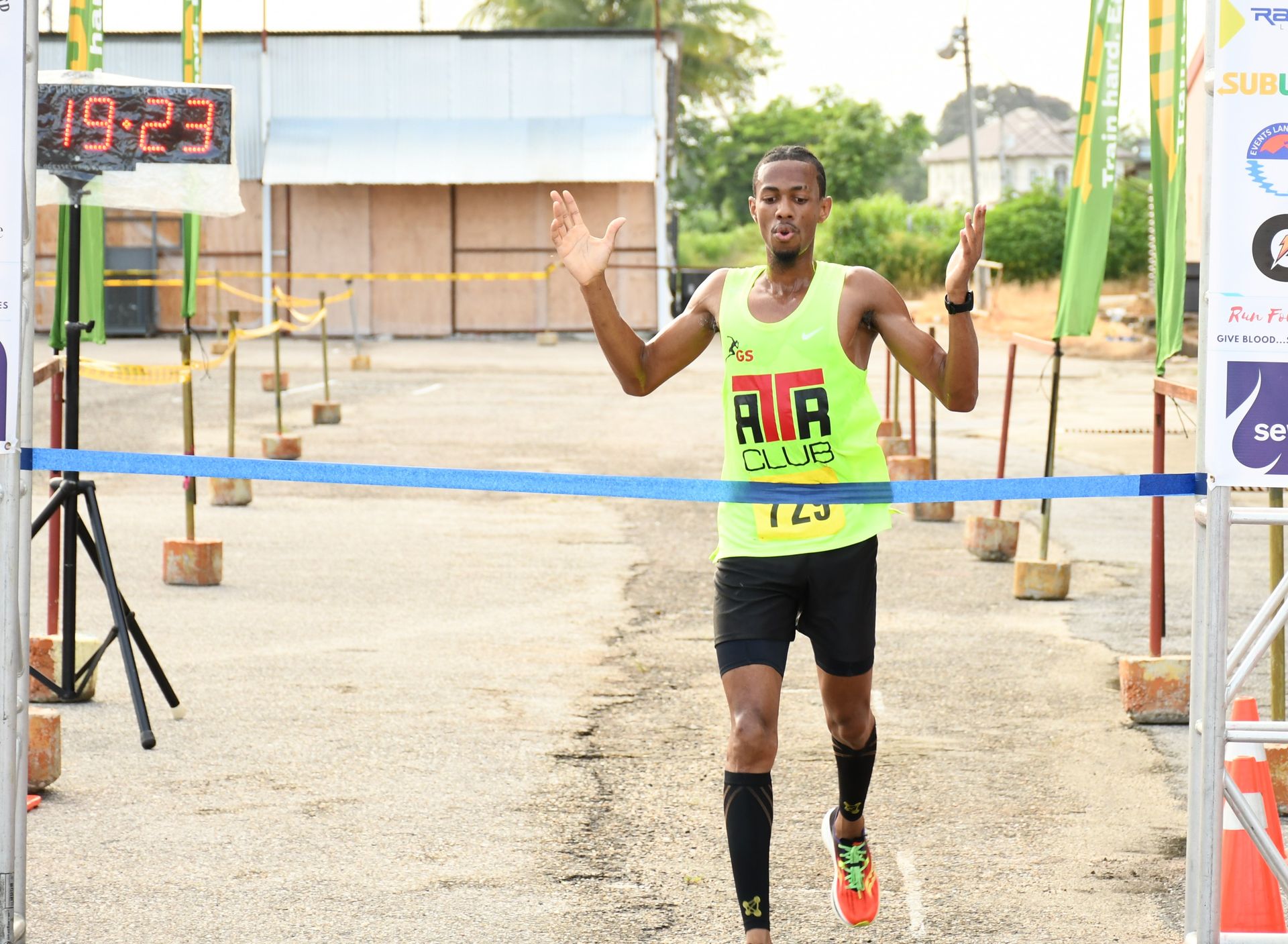 Nicholas Romany crosses the finish line to win the Sewa TT 6K road race in Chagunas on June 19.  Shastri Boodan (Image obtained at guardian.co.tt)