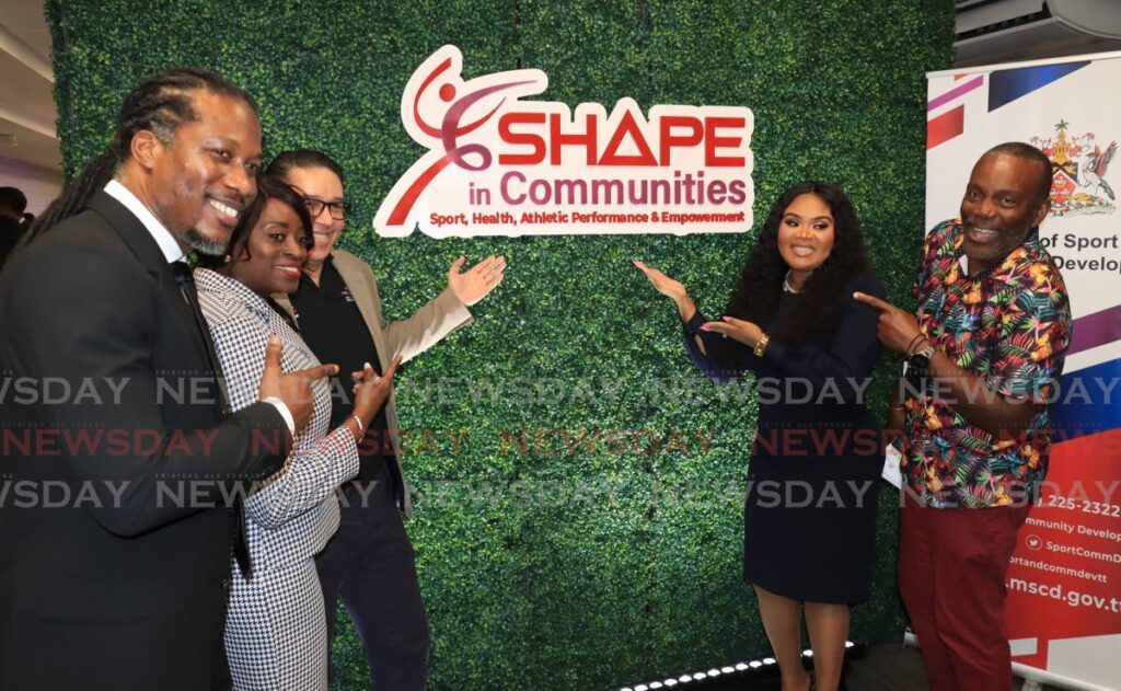 Minister Shamfa Cudjoe-Lewis, second from right, alongside government ministers (from left) Adrian Leonce, Donna Cox, Symon de Nobriga and Deputy Speaker of the House Esmond Forde, at the launch of the SHAPE communities programme, at the VIP Lounge of the Hasely Crawford Stadium, Mucurapo on February 19. - Photo by Roger Jacob (Image obtained at newsday.co.tt)