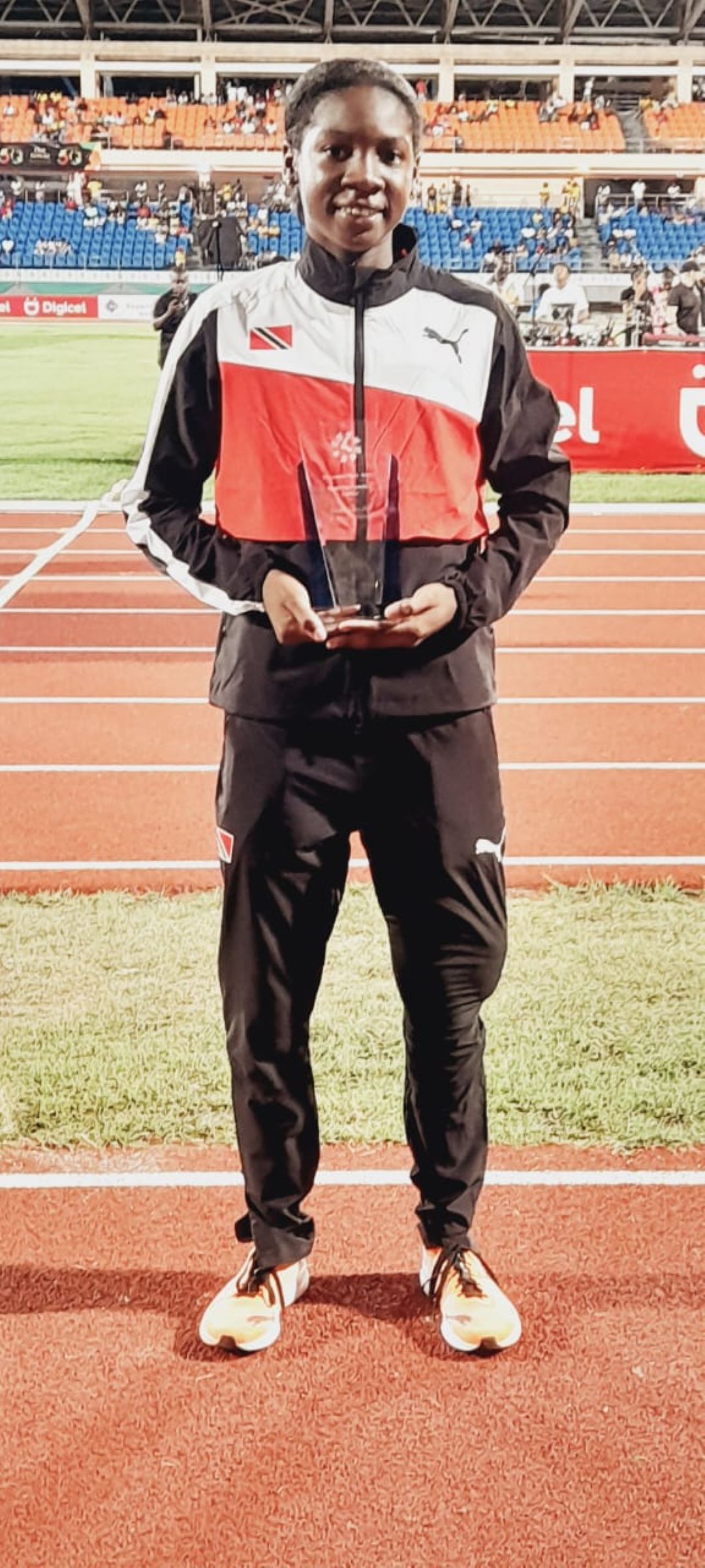 Trinidad and Tobagos Janae De Gannes, won the Austin Sealy award after a record-breaking performance in the Under-20 Girls' Long Jump event, at the Carifta Games in Grenada, on Monday 1 April 2024. [Photo: PAUL VOISIN] (Image obtained at guardian.co.tt)