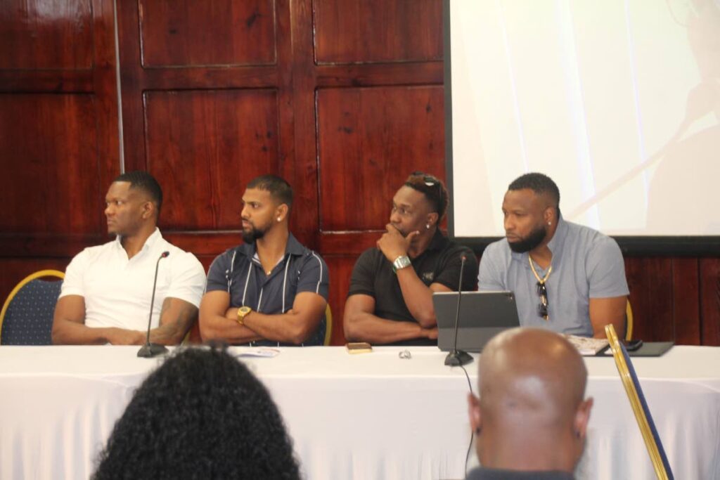 Local sporting heroes Keshorn Walcott, from left, Nicholas Pooran, Dwayne Bravo and Kieron Pollard listen to one of the speakers at a workshop hosted by the Ministry of Sport and Youth Affairs and the Sport Company of TT. - Photo courtesy SPORTT (Image obtained at newsday.co.tt)