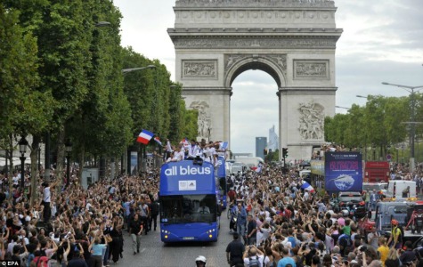 Heroes welcome: French fans swarmed the Avenue des Champs-Elysees in Paris to welcome their Olympic heroes home. The French athletes boarded an open top bus for a victory parade through the capital