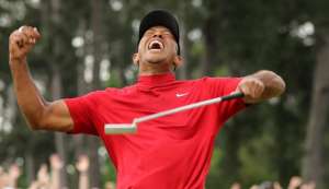 Tiger Woods celebrates after sinking his putt on the 18th that won a fifth Masters at Augusta National. Photograph: Lucy Nicholson/Reuters Tiger Woods celebrates after sinking his putt on the 18th that won a fifth Masters at Augusta National. Photograph: Lucy Nicholson/Reuters