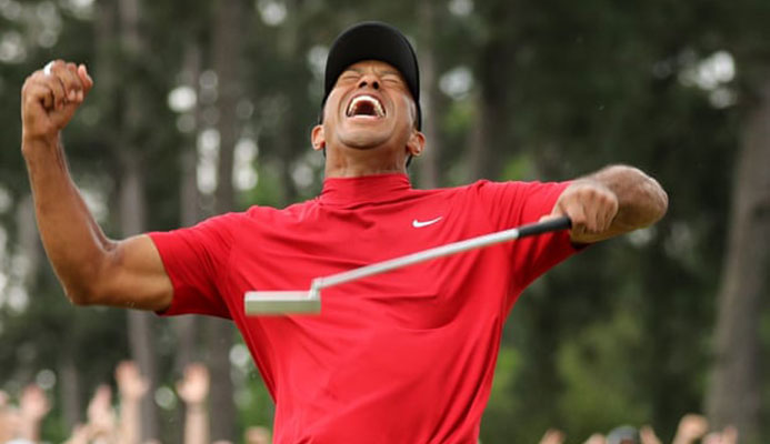 Tiger Woods celebrates after sinking his putt on the 18th that won a fifth Masters at Augusta National. Photograph: Lucy Nicholson/Reuters Tiger Woods celebrates after sinking his putt on the 18th that won a fifth Masters at Augusta National. Photograph: Lucy Nicholson/Reuters
