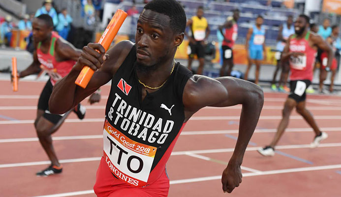 In this file photo, Jereem Richards competes in the men’s 4x400m relay final during the 2018 Gold Coast Commonwealth Games at the Carrara Stadium on the Gold Coast on April 14,2018.