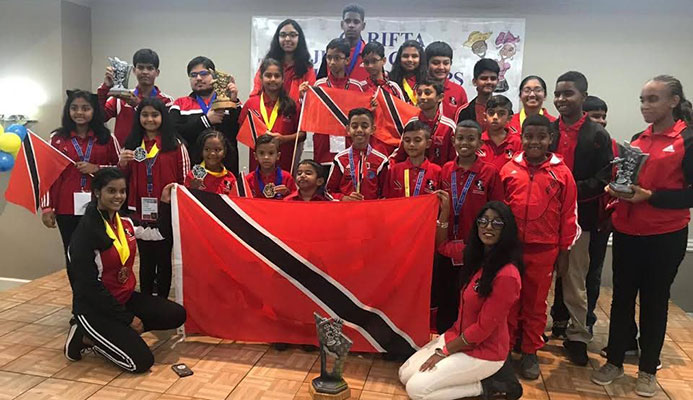 TT’s chess team display their medals and trophies after competing at the Carifta Chess Championships, in Curacoa, on the Easter weekend. TT’s chess team display their medals and trophies after competing at the Carifta Chess Championships, in Curacoa, on the Easter weekend.