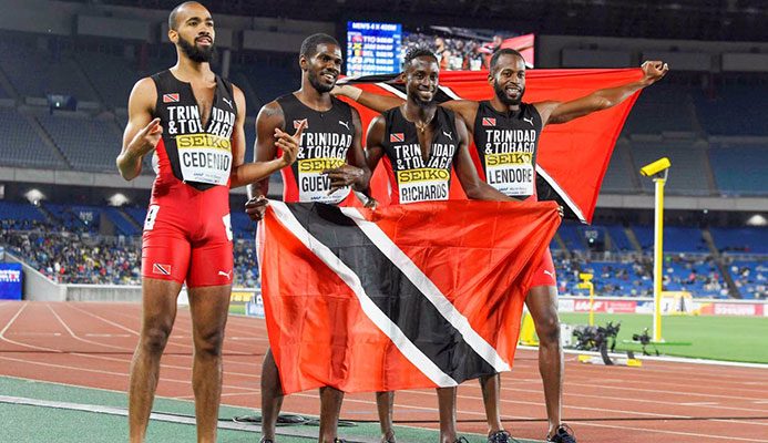 GOLDEN QUARTET: (left to right) TT’s Machel Cedenio, Asa Guevera, Jereem Richards and Deon Lendore celebrate after winning the 4x400 meters relay final at the IAAF World Relays on Sunday, in Yokohama, Japan. via AP