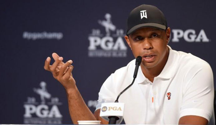 May 14, 2019; Farmingdale, NY, USA; Tiger Woods addresses the media during a press conference before the PGA Championship golf tournament at Bethpage State Park - Black Course. Mandatory Credit: John David Mercer-USA TODAY Sports May 14, 2019; Farmingdale, NY, USA; Tiger Woods addresses the media during a press conference before the PGA Championship golf tournament at Bethpage State Park - Black Course. Mandatory Credit: John David Mercer-USA TODAY Sports