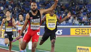 IT'S OVER: Machel Cedenio crosses the finish line to anchor TT to the 4x400m gold at the IAAF World Relays in Yokohama, Japan. IT'S OVER: Machel Cedenio crosses the finish line to anchor TT to the 4x400m gold at the IAAF World Relays in Yokohama, Japan.